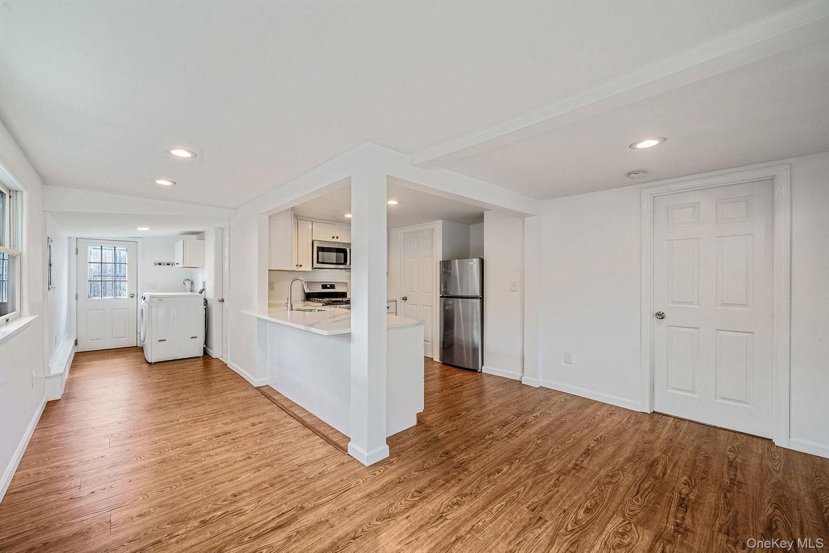 Interior, Kitchen, Recessed Lighting, Stainless Steel Appliances, Washer, Wood Texture Flooring