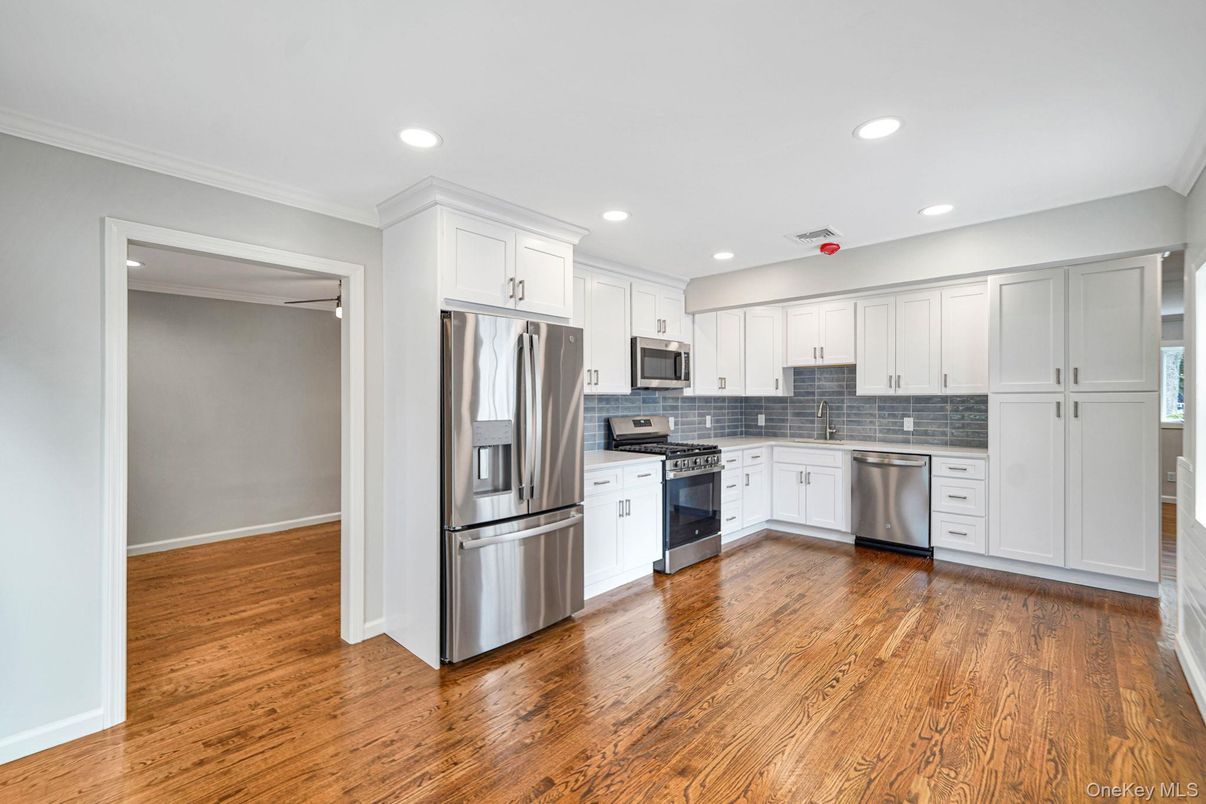 Interior, Kitchen, Recessed Lighting, Stainless Steel Appliances, Wood Texture Flooring
