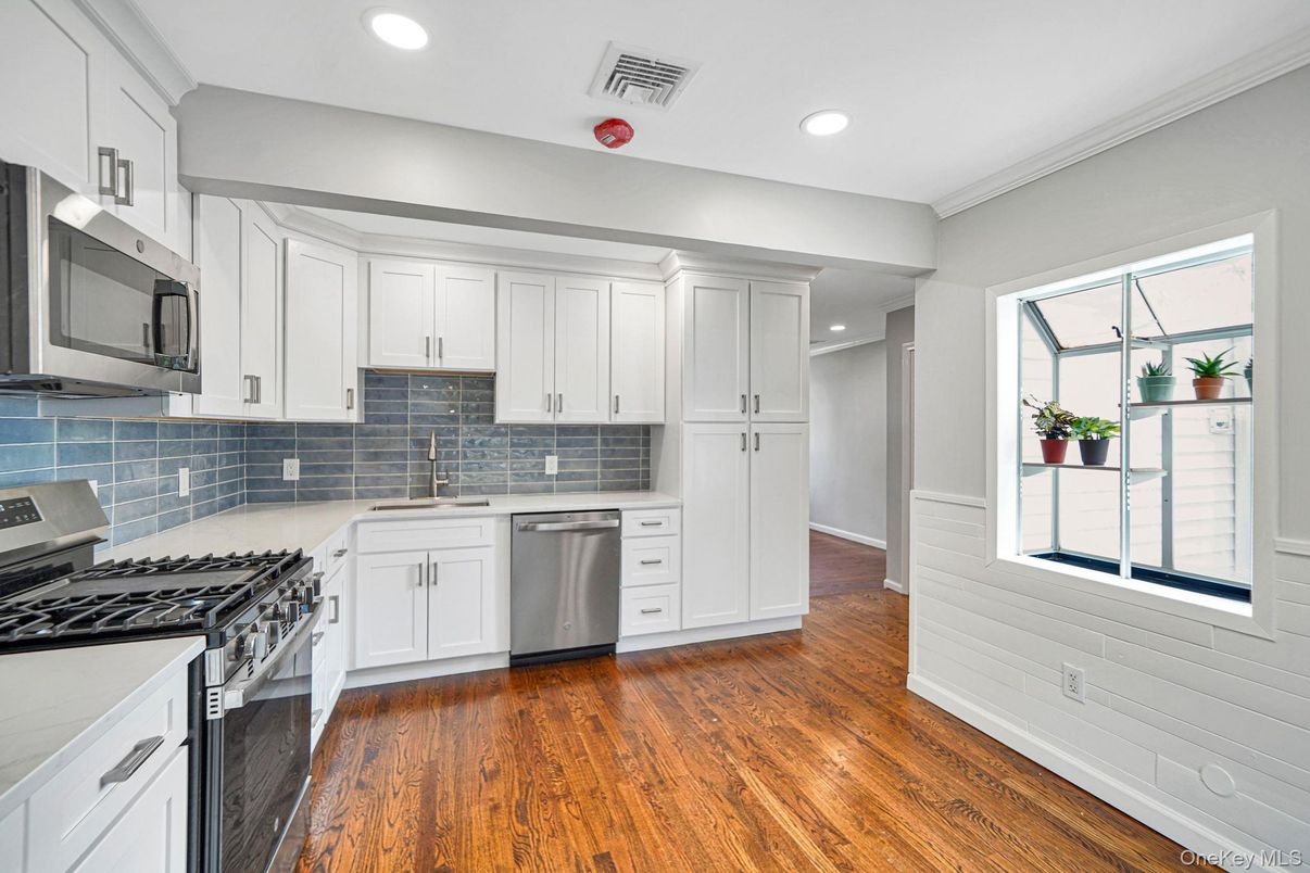 Interior, Kitchen, Recessed Lighting, Stainless Steel Appliances, Wood Texture Flooring