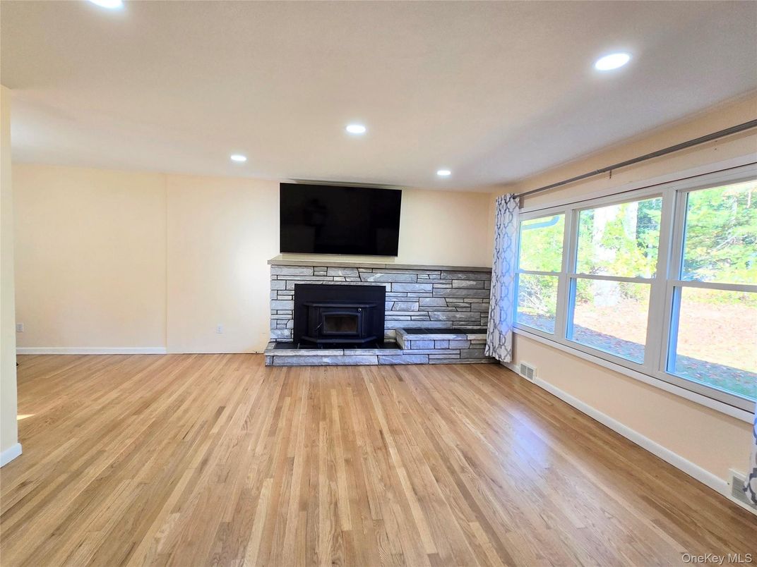 Empty room, Fireplace, Interior, Recessed Lighting, Wood Texture Flooring