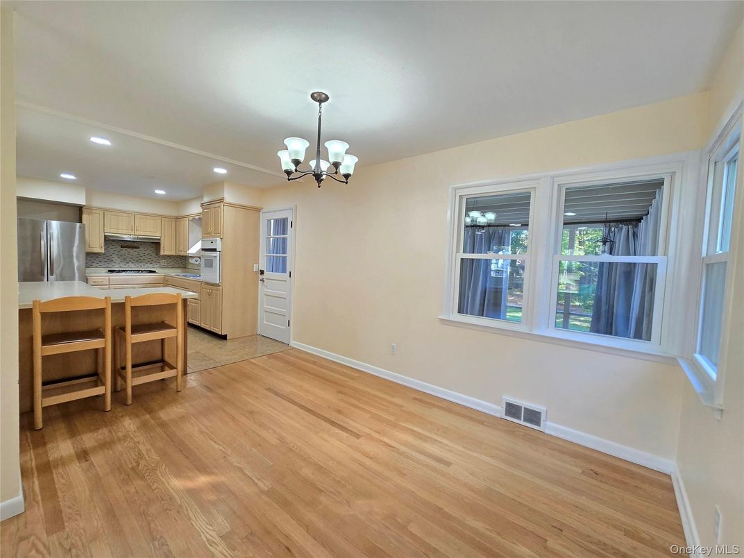 Chandelier, Interior, Kitchen, Recessed Lighting, Stainless Steel Appliances, Wood Texture Flooring