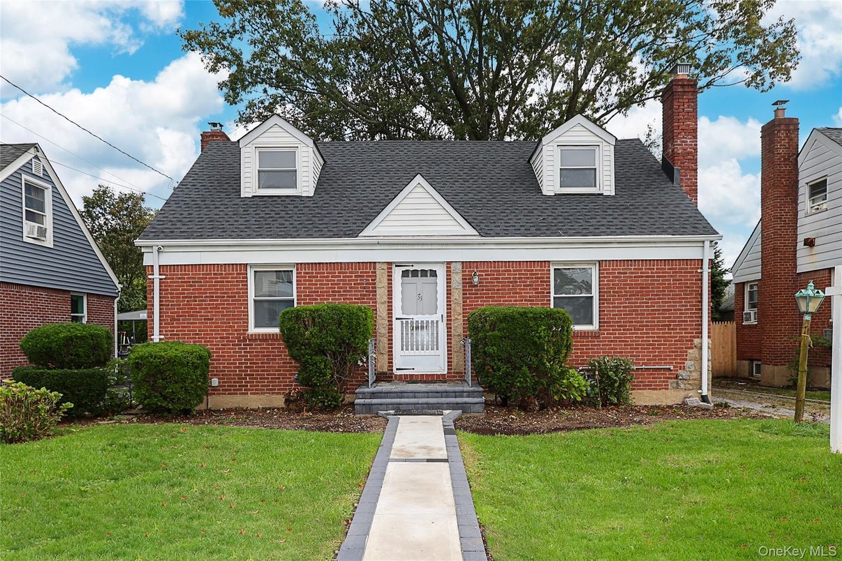 Exterior, Facade, Brick Facade, Cape Cod