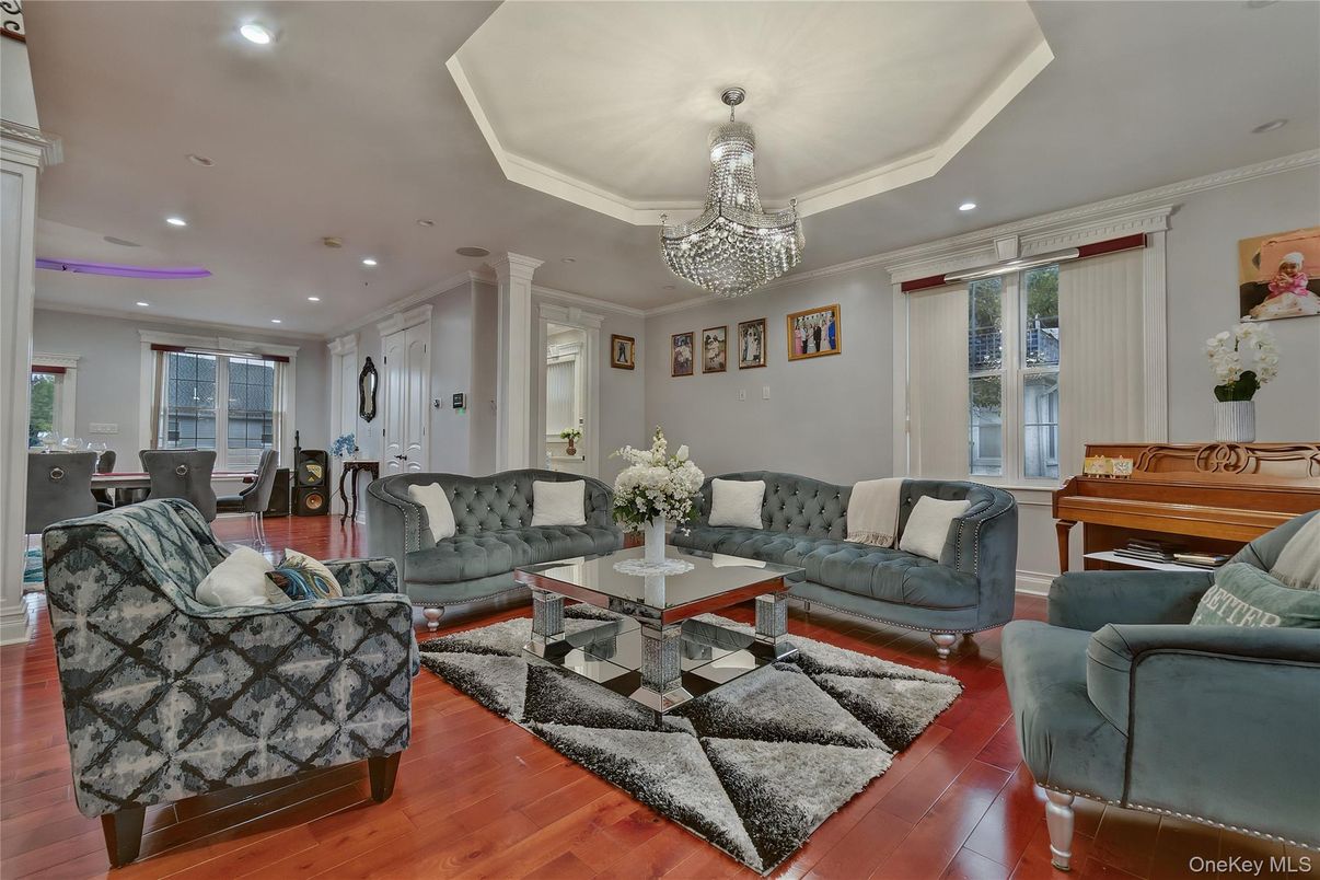 Chandelier, Dining room, Interior, Living room, Piano, Recessed Lighting, Wood Texture Flooring