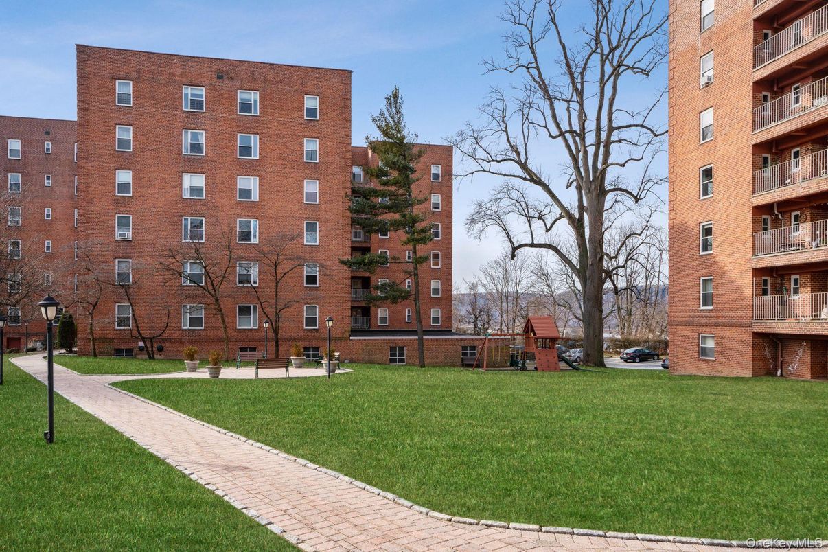 Exterior, Facade, Brick Facade, Condo Building