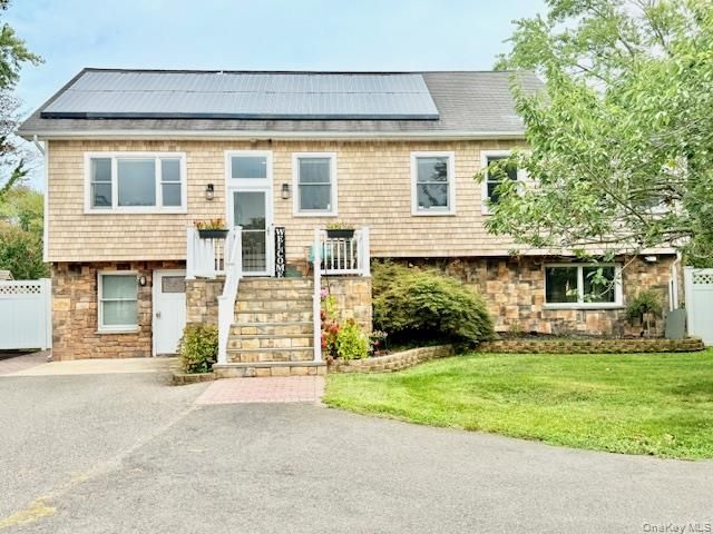 Attached, Exterior, Facade, Solar Panels, Raised Ranch