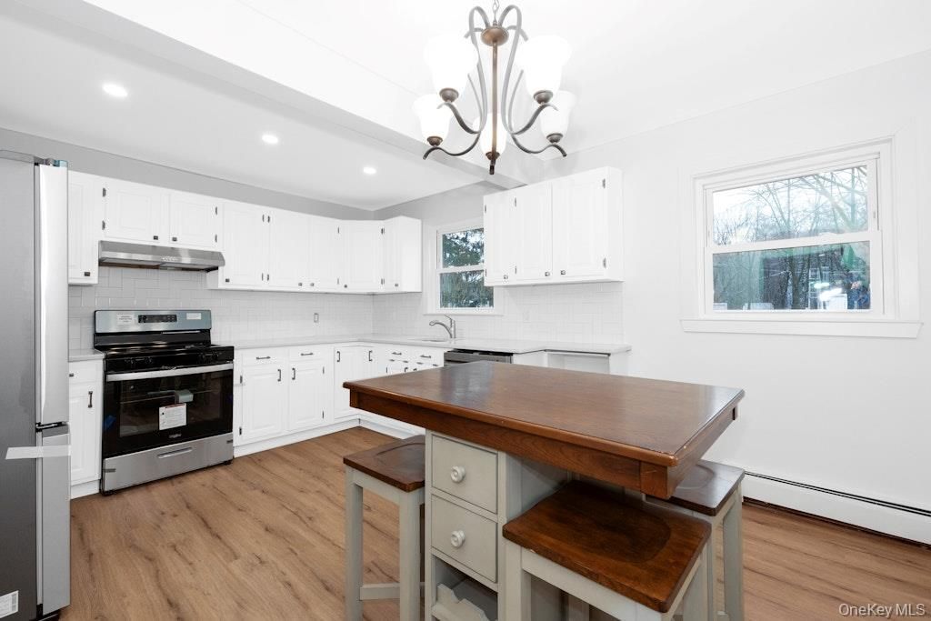 Chandelier, Interior, Kitchen, Recessed Lighting, Stainless Steel Appliances, Wood Texture Flooring