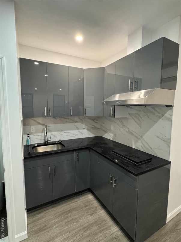 Interior, Kitchen, Marble Walls, Recessed Lighting, Wood Texture Flooring