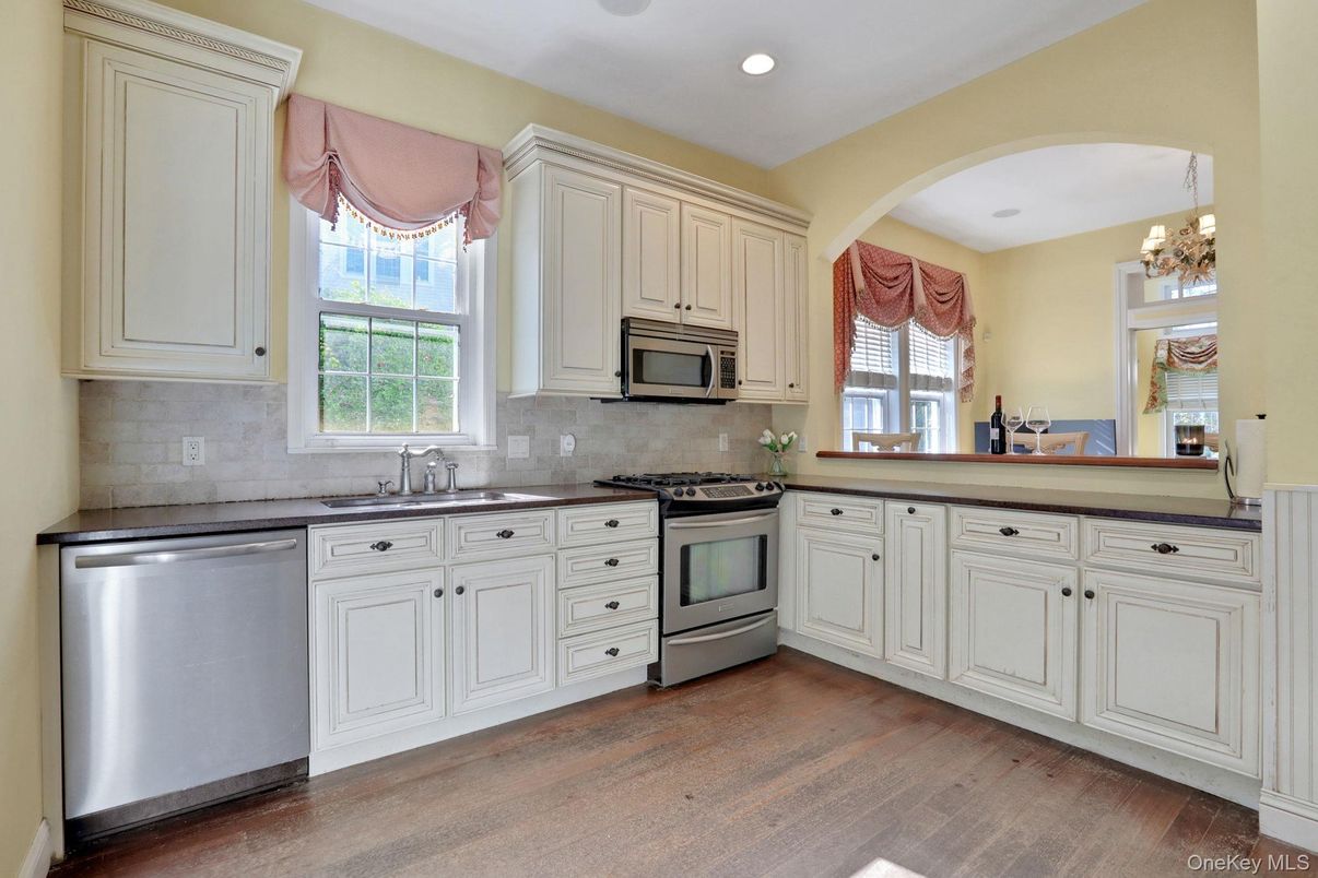 Chandelier, Interior, Kitchen, Recessed Lighting, Stainless Steel Appliances, Wood Texture Flooring