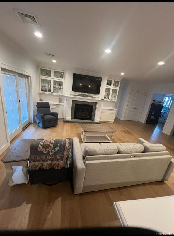 Fireplace, Interior, Living room, Recessed Lighting, Wood Texture Flooring