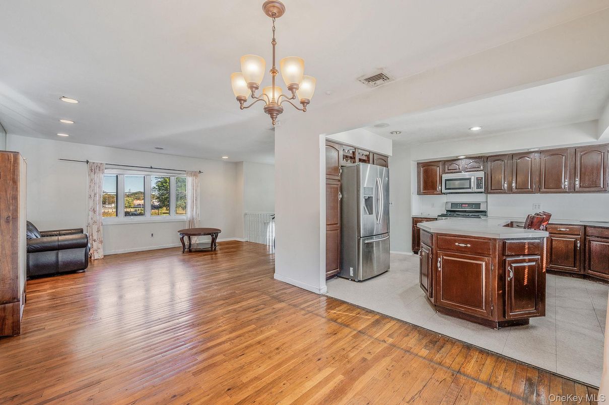 Chandelier, Interior, Kitchen, Recessed Lighting, Stainless Steel Appliances, Wood Texture Flooring