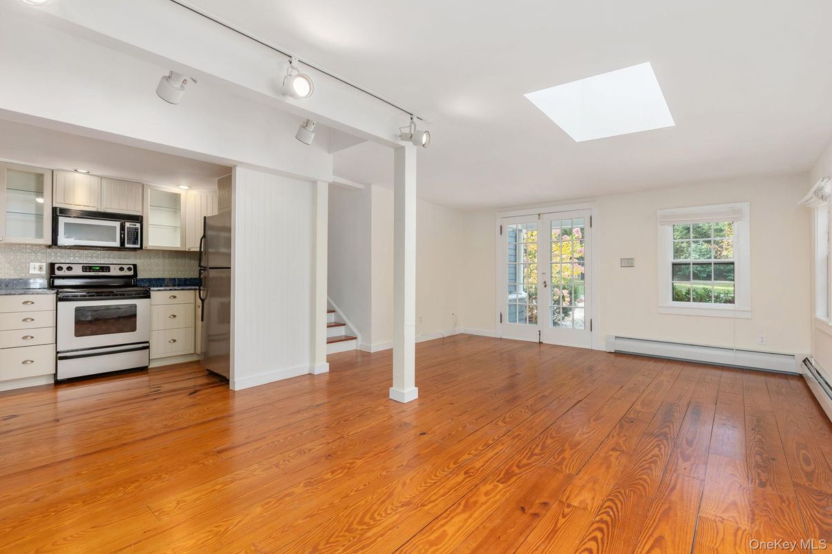 Empty room, Interior, Kitchen, Stainless Steel Appliances, Wood Texture Flooring
