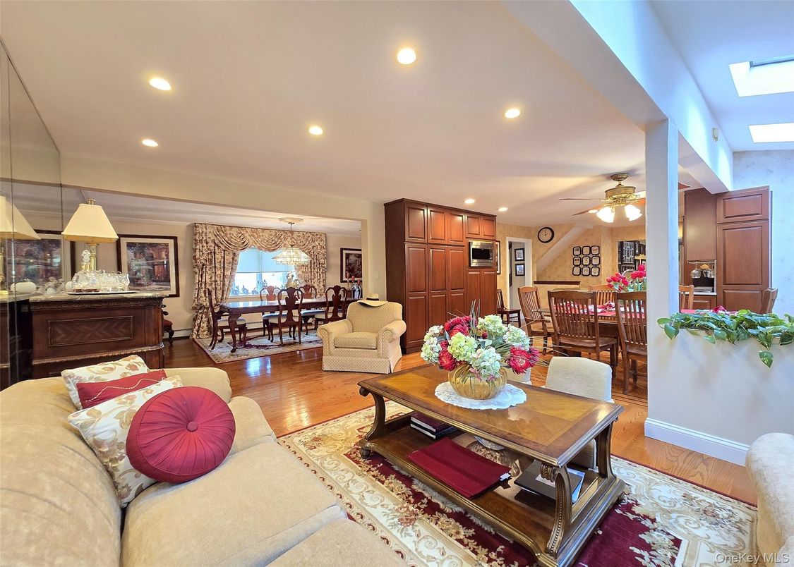 Dining room, Interior, Kitchen, Living room, Recessed Lighting, Stainless Steel Appliances, Wood Texture Flooring