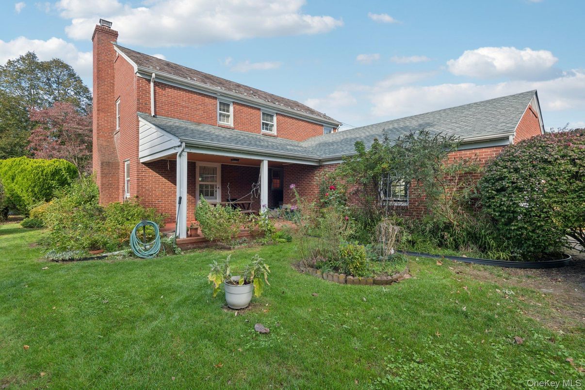 Exterior, Facade, Brick Facade, Cape Cod