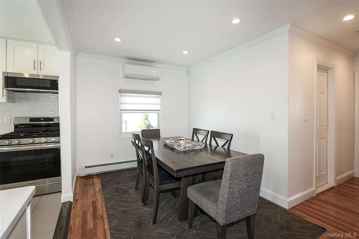 Dining room, Interior, Kitchen, Recessed Lighting, Stainless Steel Appliances, Wood Texture Flooring