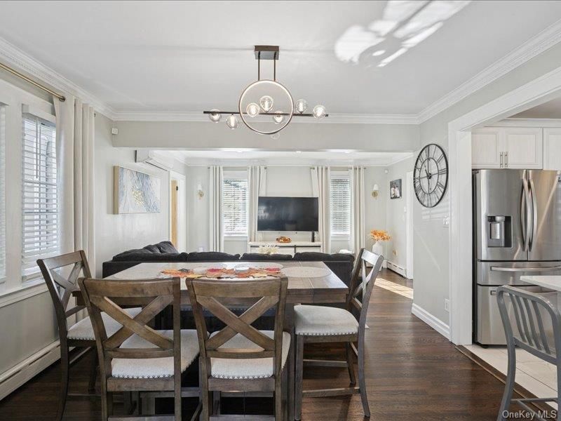 Dining room, Interior, Pendant Lights, Stainless Steel Appliances, Wood Texture Flooring