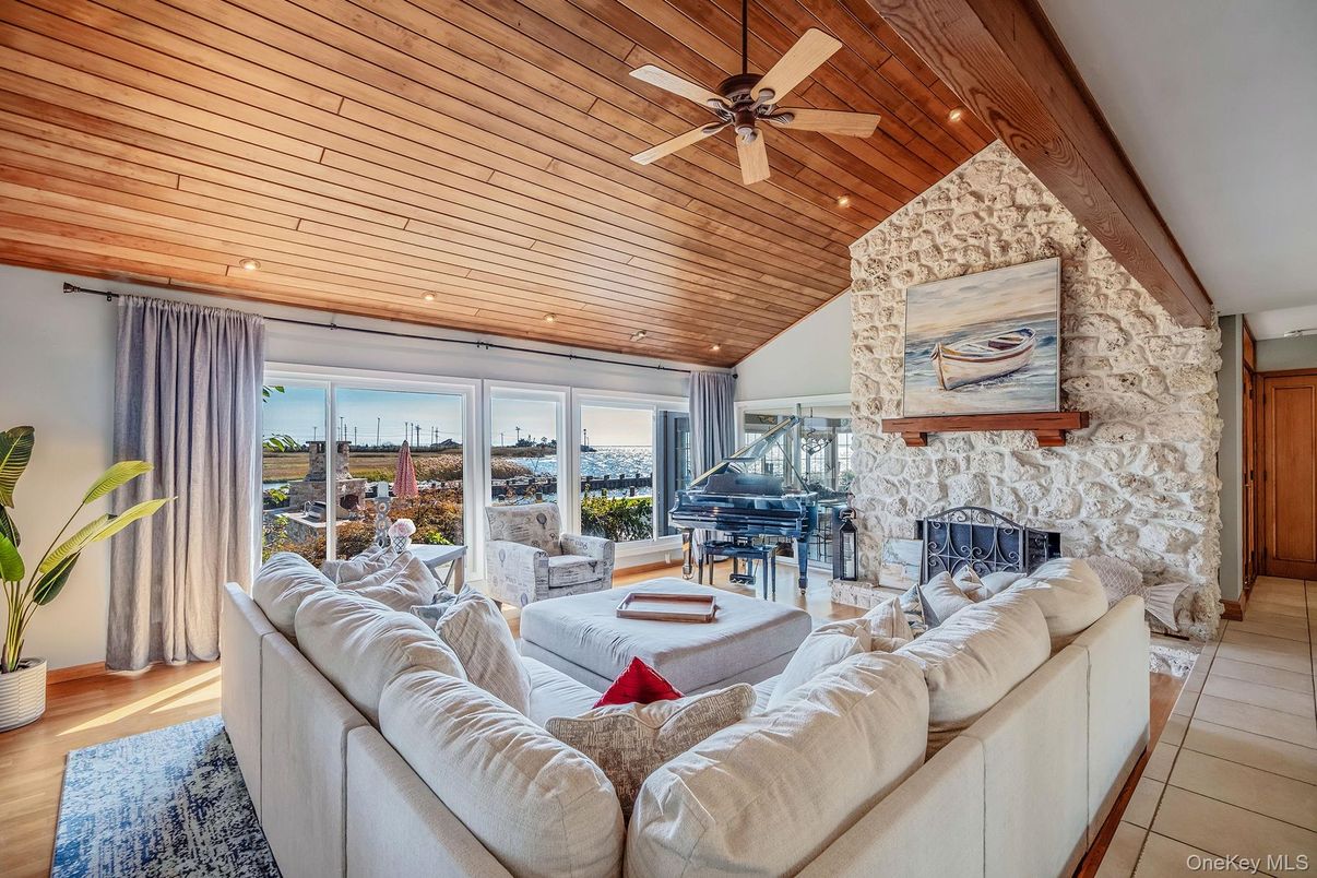 Fireplace, Interior, Living room, Piano, Recessed Lighting, Stone Walls, Wooden Ceilings, Wood Texture Flooring