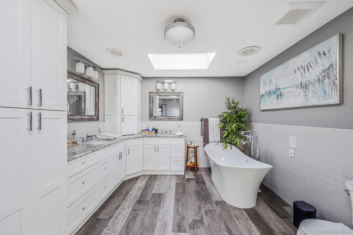 Bathroom, Dual Sink Vanities, Free Standing Baths, Interior, Wood Texture Flooring