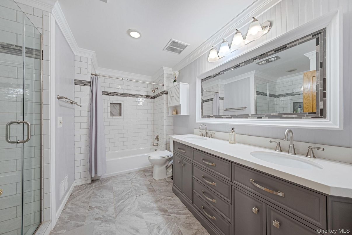 Bathroom, Dual Sink Vanities, Glass Shower, Interior, Marble, Recessed Lighting