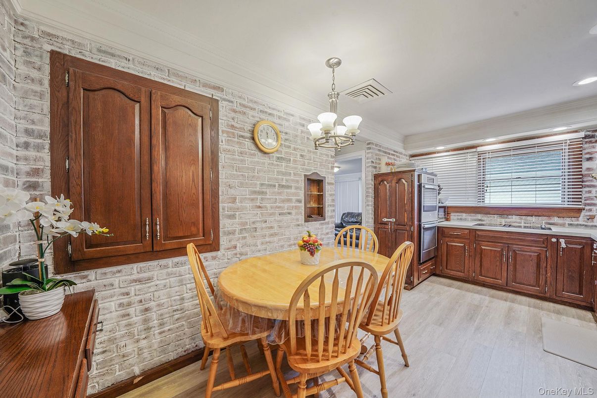 Chandelier, Dining room, Interior, Recessed Lighting, Stone Walls, Wood Texture Flooring