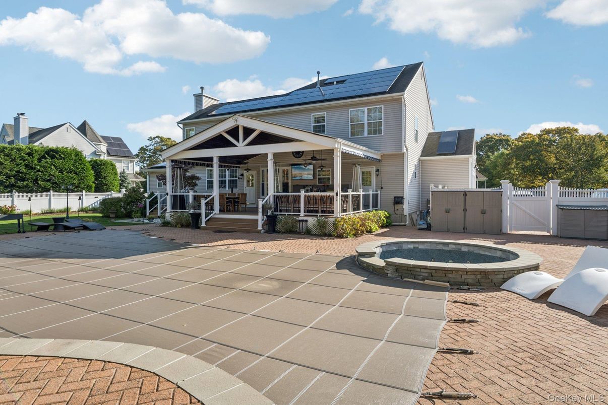 Exterior, Pool, Solar Panels