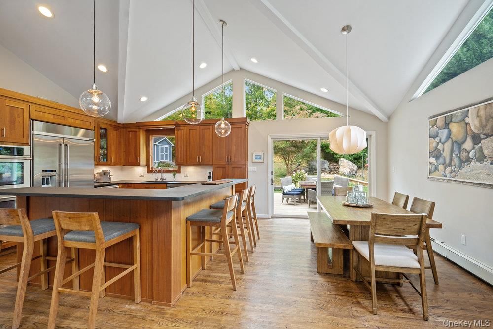 Dining room, Interior, Kitchen, Pendant Lights, Recessed Lighting, Stainless Steel Appliances, Wood Texture Flooring