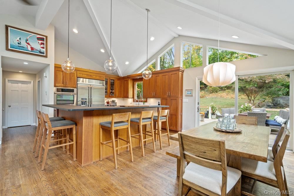 Dining room, Interior, Kitchen, Pendant Lights, Recessed Lighting, Stainless Steel Appliances, Wood Texture Flooring
