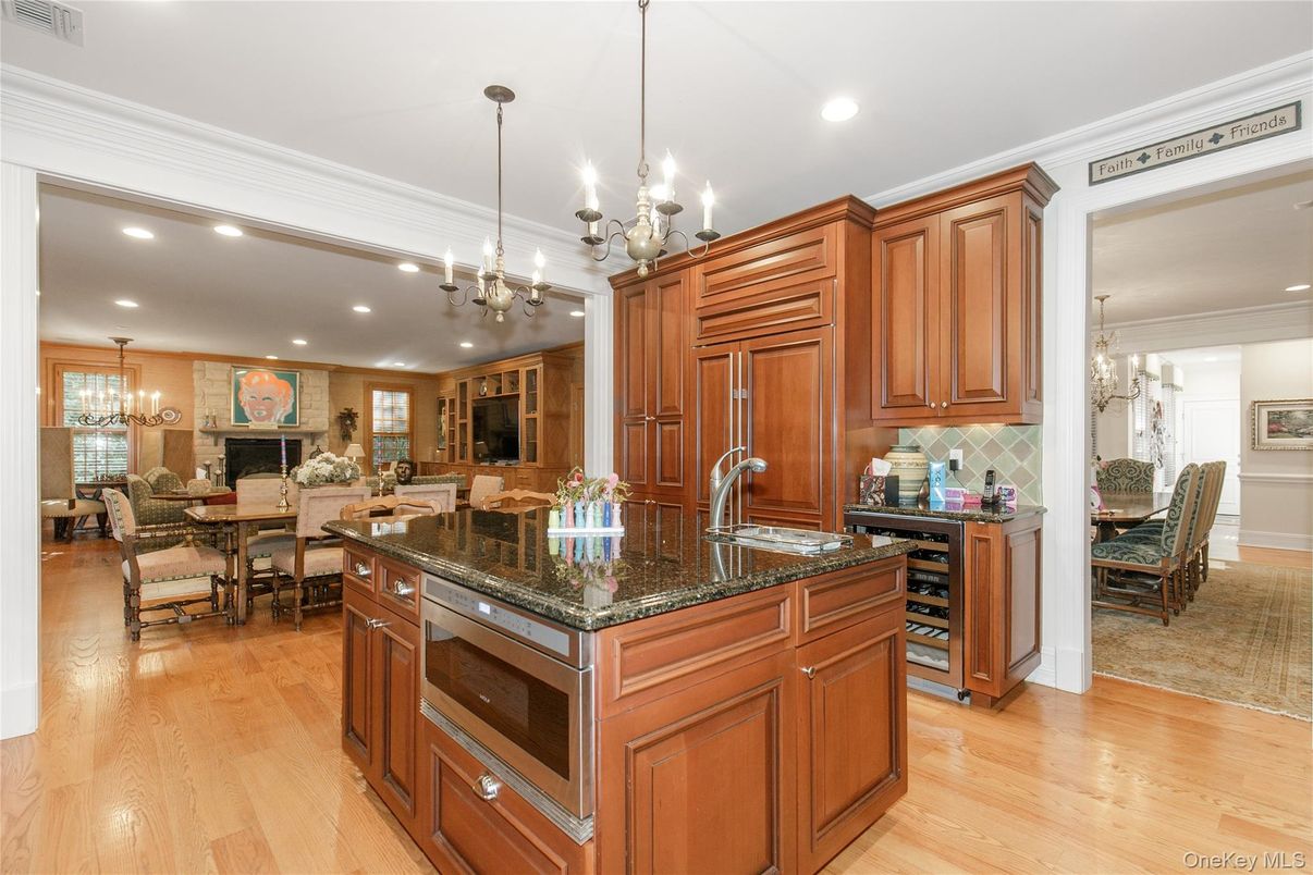 Chandelier, Dining room, Fireplace, Interior, Kitchen, Pendant Lights, Recessed Lighting, Wood Texture Flooring
