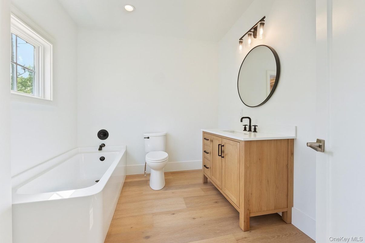 Bathroom, Dual Sink Vanities, Interior, Recessed Lighting, Wood Texture Flooring