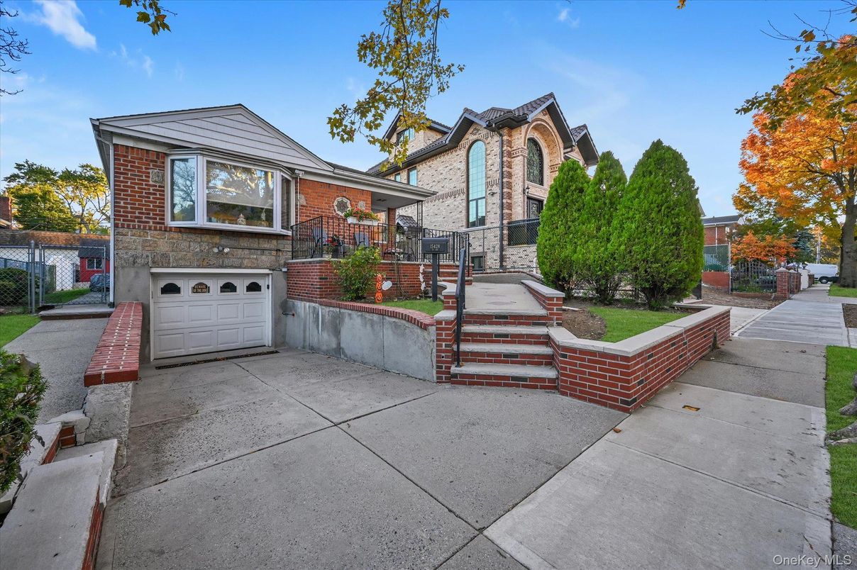 Attached, Exterior, Facade, Brick Facade, Tudor Revival