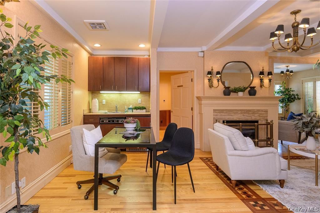 Chandelier, Fireplace, Home Office, Interior, Living room, Recessed Lighting, Wood Texture Flooring