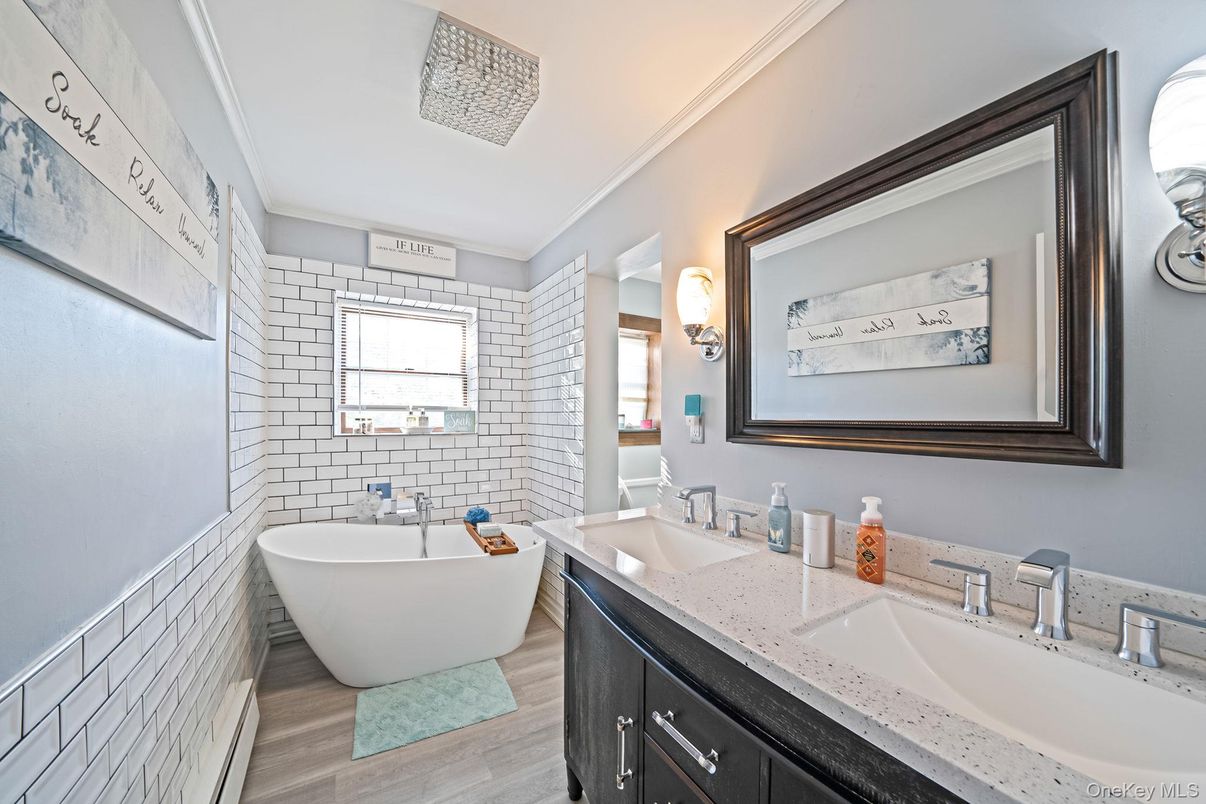 Bathroom, Dual Sink Vanities, Free Standing Baths, Interior, Wood Texture Flooring