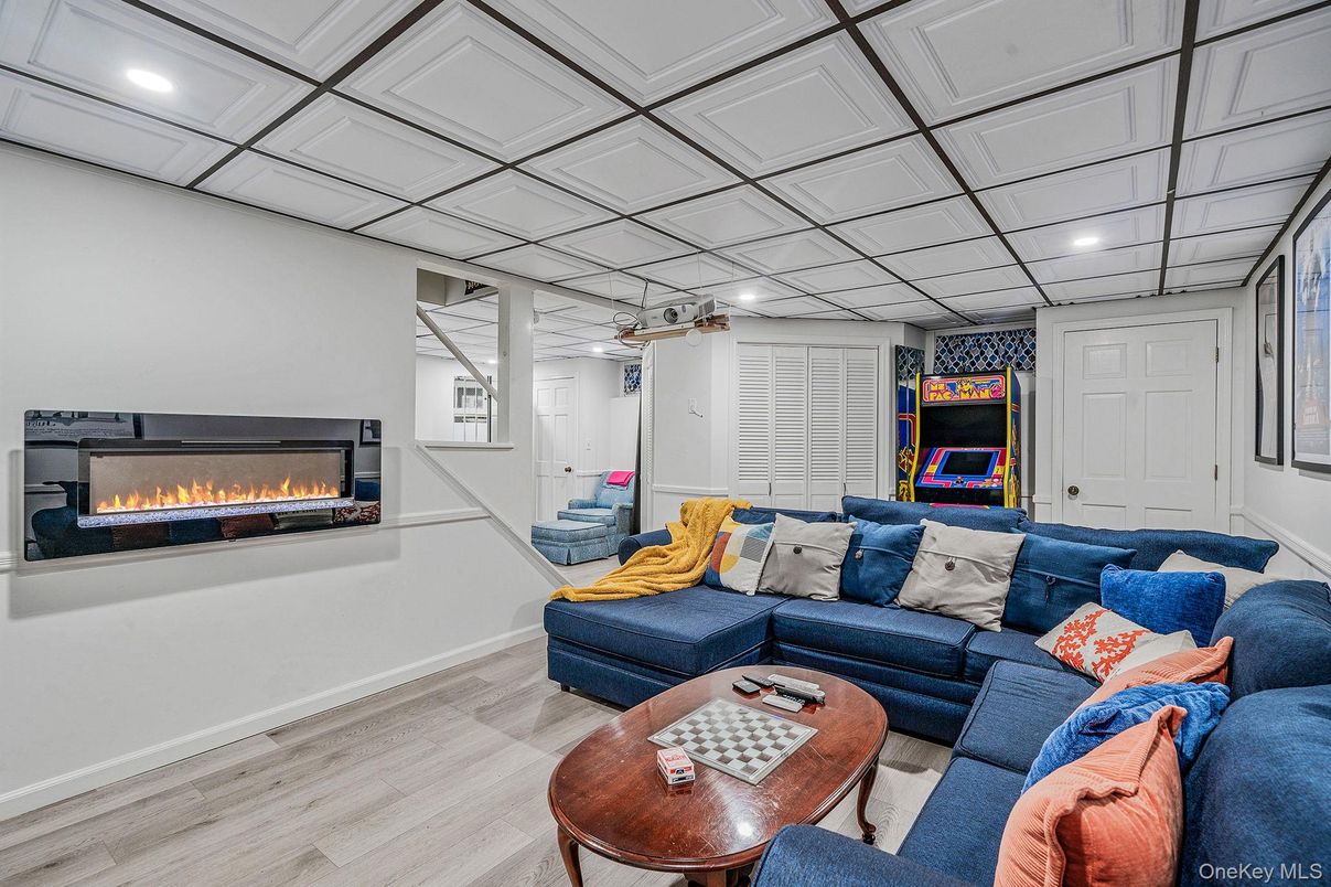 Fireplace, Interior, Living room, Recessed Lighting, Wood Texture Flooring