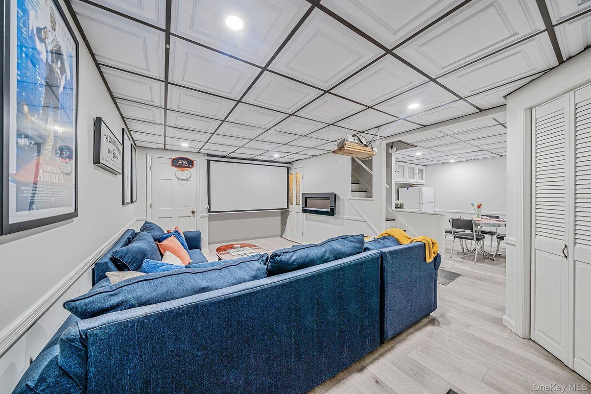 Dining room, Interior, Living room, Projection Screen, Recessed Lighting, Wood Texture Flooring