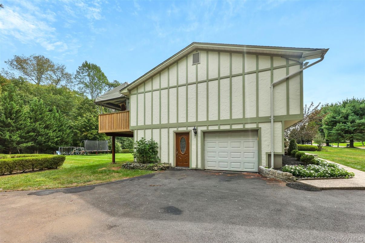 Attached, Exterior, Facade, Tudor Revival
