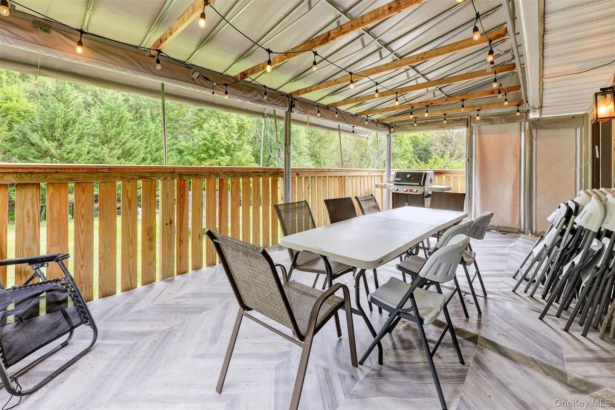 Exterior, Interior, Sun Room, Wood Texture Flooring