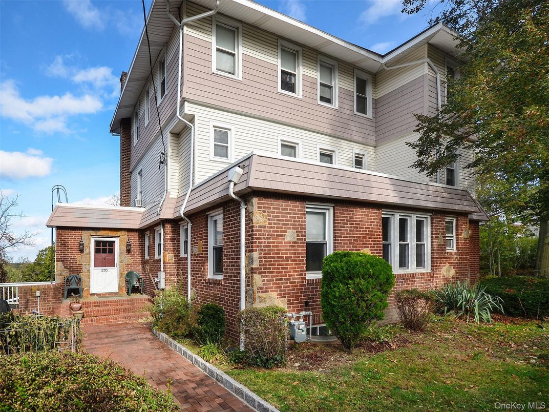 Exterior, Facade, Brick Facade, American Foursquare