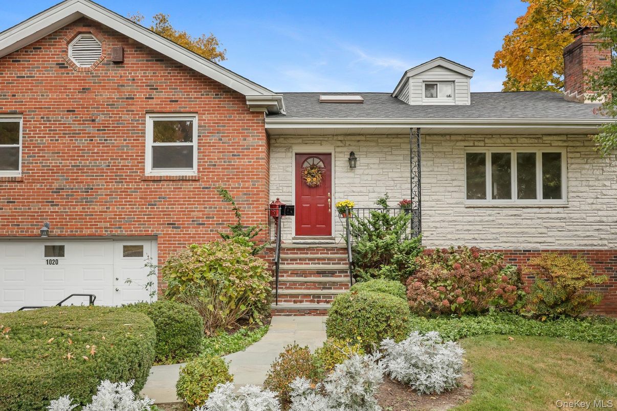 Exterior, Facade, Brick Facade, Raised Ranch