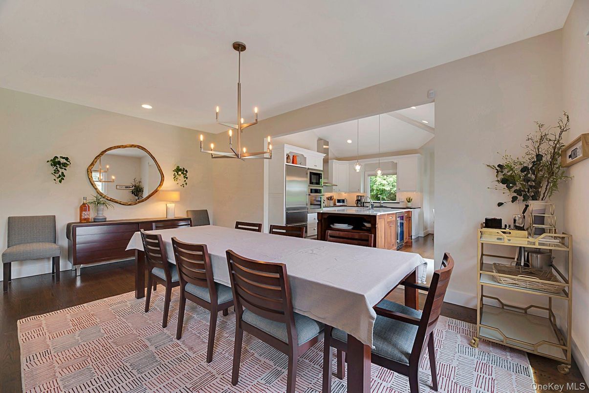 Dining room, Interior, Kitchen, Pendant Lights, Recessed Lighting, Stainless Steel Appliances, Wood Texture Flooring