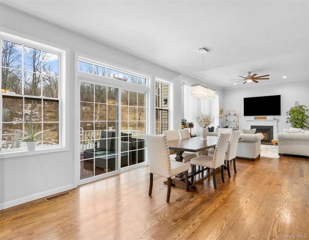 Chandelier, Dining room, Fireplace, Interior, Living room, Recessed Lighting, Wood Texture Flooring