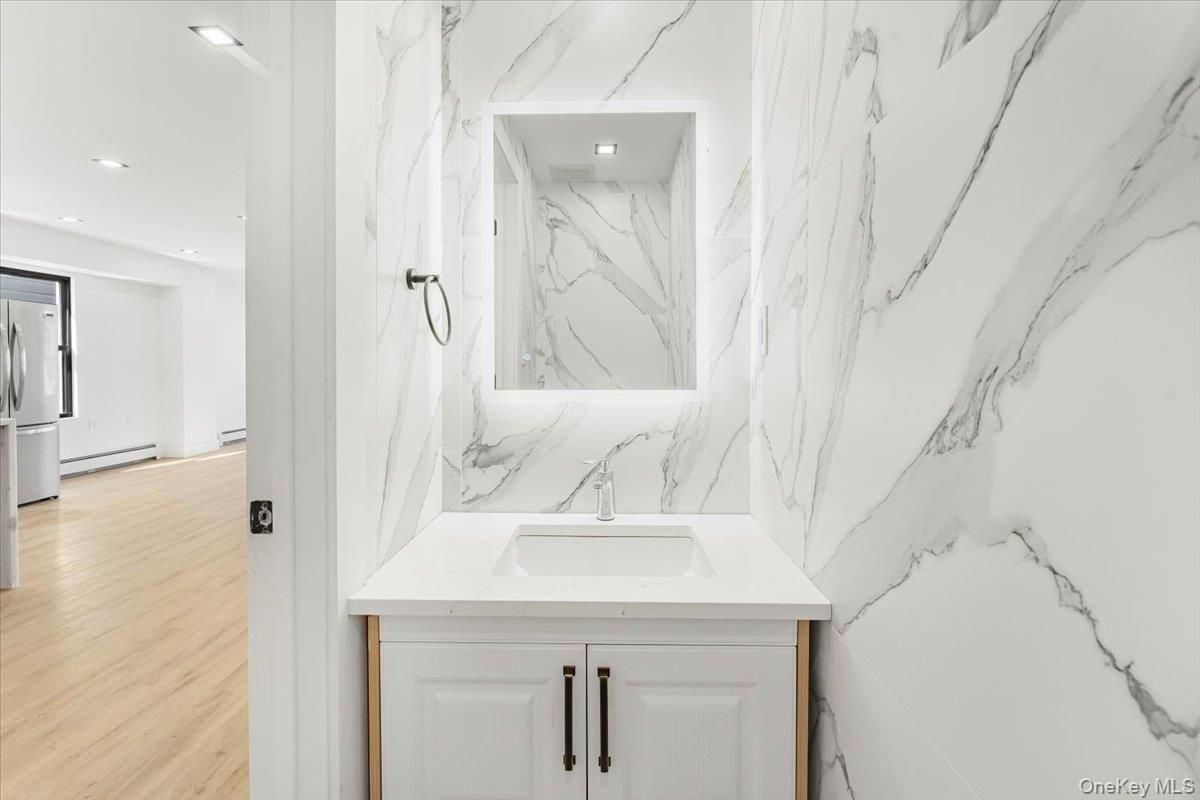 Bathroom, Interior, Marble Walls, Recessed Lighting, Wood Texture Flooring