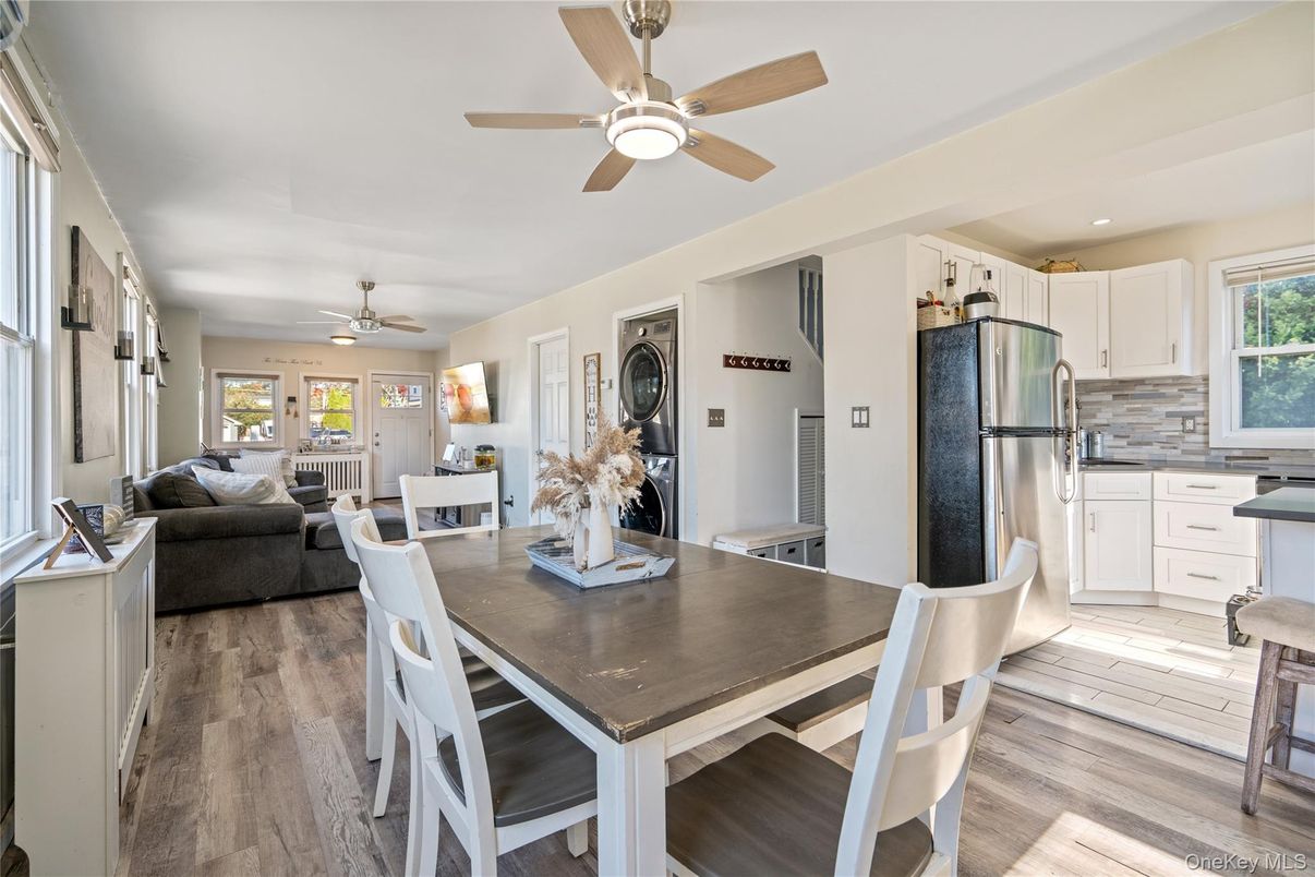 Dining room, Interior, Kitchen, Living room, Recessed Lighting, Stainless Steel Appliances, Wood Texture Flooring