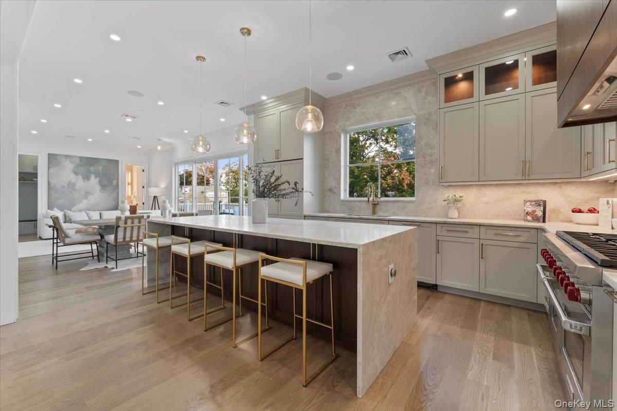 Dining room, Interior, Kitchen, Pendant Lights, Recessed Lighting, Stainless Steel Appliances, Wood Texture Flooring
