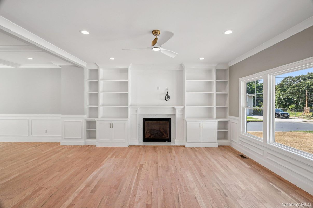 Empty room, Fireplace, Interior, Recessed Lighting, Wood Texture Flooring