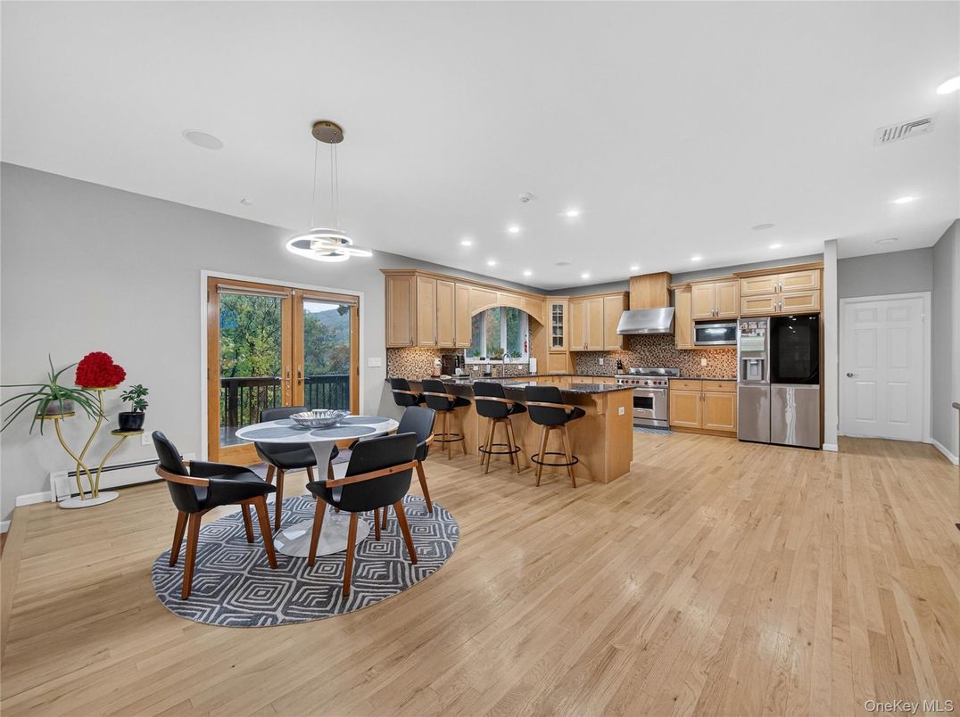 Dining room, Interior, Kitchen, Pendant Lights, Recessed Lighting, Stainless Steel Appliances, Wood Texture Flooring