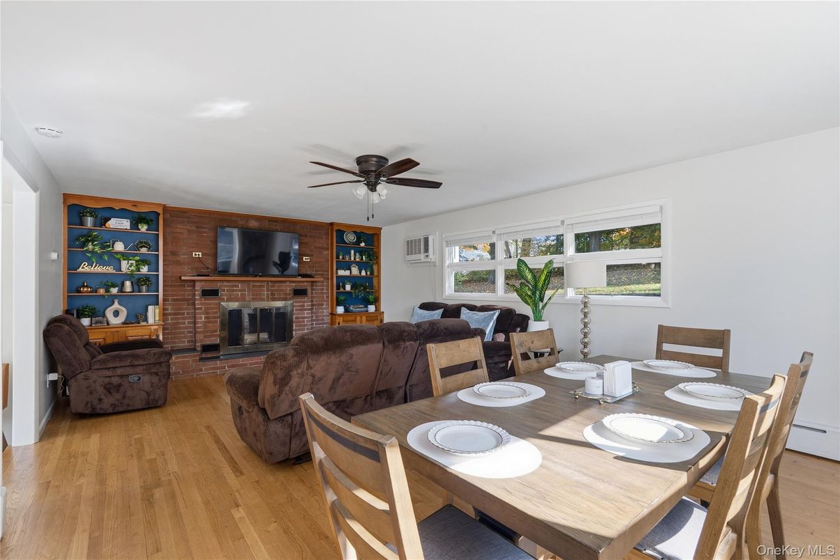 Dining room, Fireplace, Interior, Living room, Stone Walls, Wood Texture Flooring