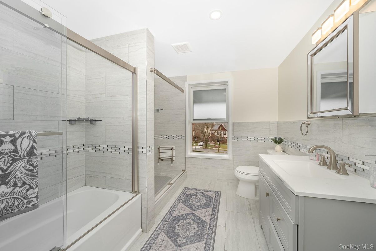 Bathroom, Glass Shower, Interior, Recessed Lighting, Water, Wood Texture Flooring