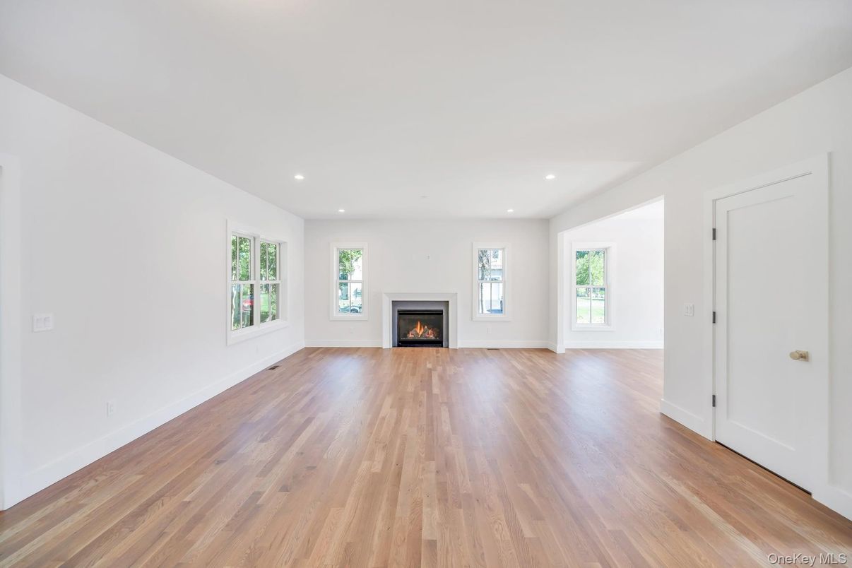 Empty room, Fireplace, Interior, Recessed Lighting, Wood Texture Flooring