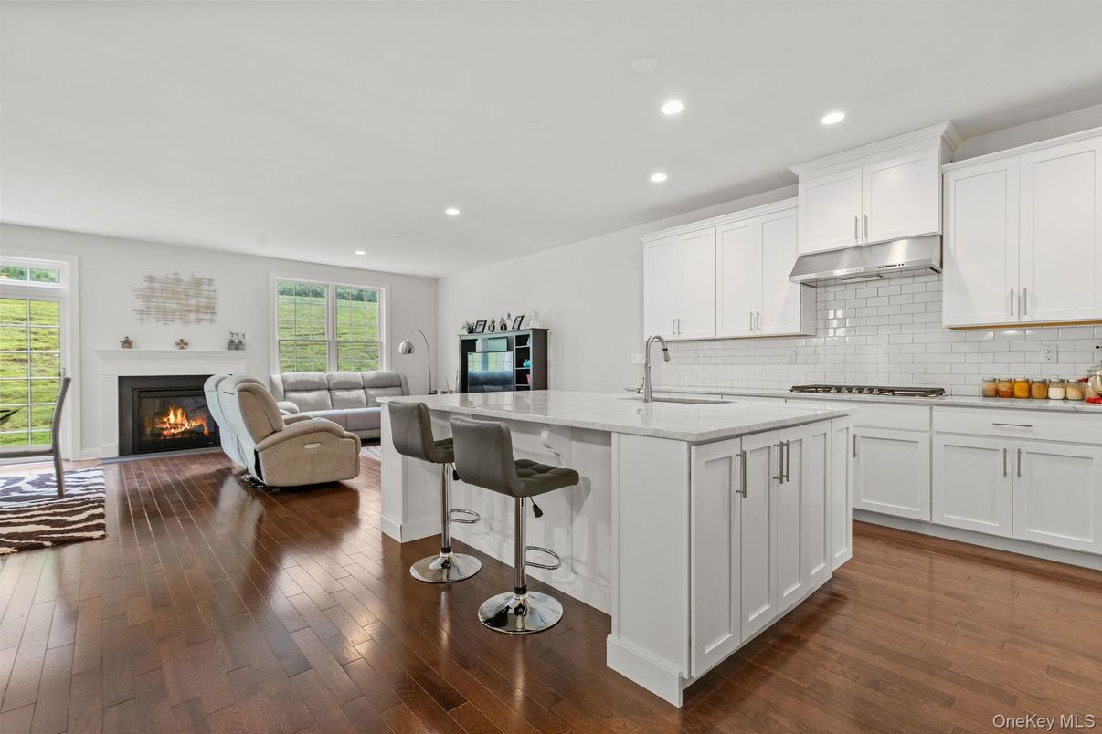 Fireplace, Interior, Kitchen, Living room, Recessed Lighting, Wood Texture Flooring