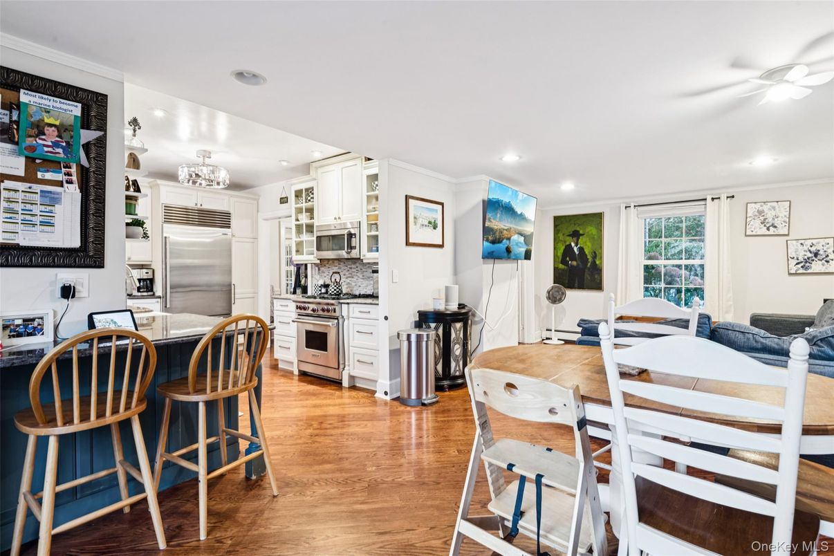 Dining room, Interior, Kitchen, Recessed Lighting, Stainless Steel Appliances, Wood Texture Flooring