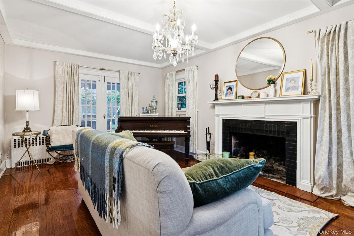 Chandelier, Fireplace, Interior, Living room, Piano, Wood Texture Flooring